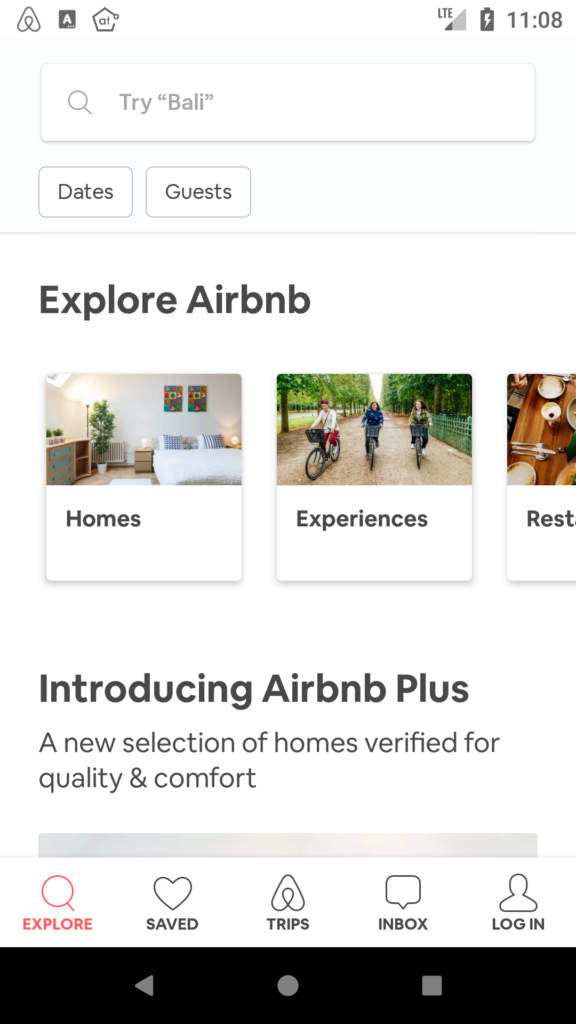 The first screen of Airbnb app that includes a search bar, major categories on Airbnb including homes, experiences and restaurants, an introduction to new features, and a navigation bar.