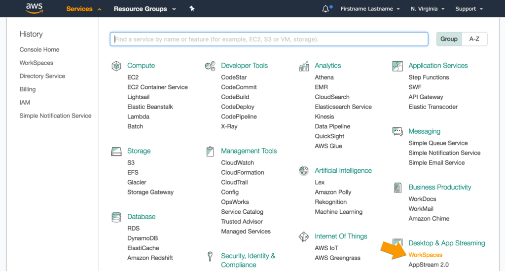 Screenshot of the AWS services menu when toggled open. An arrow annotation points to the WorkSpaces navigation option located under the Desktop & App Streaming section. There are twelve other sections present: Compute, Storage, Database, Developer Tools, Management Tools, Security, Identity & Compliance, Analytics, Artificial Intelligence, Internet Of Things, Application Services, Messaging, Business Productivity, and Desktop & App Streaming. A search bar and group/alphabetical toggle button are also present.