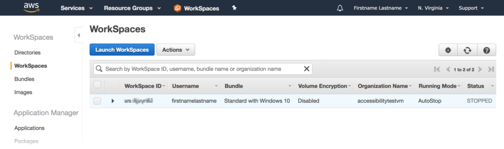 Screenshot of the WorkSpaces subsection of the WorkSpaces section. A button labeled 'Launch Workspaces' is present underneath the page’s title. Below the button is a table, with seven columns and one row. The columns read 'WorkSpace ID', 'Username', 'Bundle', 'Volume Encryption', 'Organization Name', 'Running Mode', and 'Status'. The row has an obfuscated entry for WorkSpace ID, a username of 'firstnameLastname', a Bundle of 'Standard with Windows 10', volume Encryption set to 'Disabled', an Organization Name of 'accessibilityTestVM', a Running Mode of 'AutoStop', and a status of 'Stopped'.